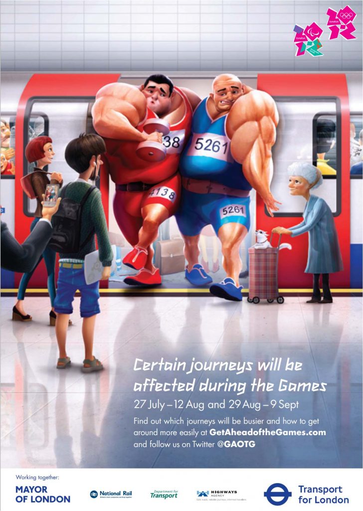Poster for the London 2012 Games. Main image is a cartoon of two very bulky weightlifters squeezing through through the doorway of an Underground train at a station platform, with other passengers looking on. The main text is: "Certain journeys will be affected during the Games, 27 July - 12 Aug and 29 Aug - 9 Sept. Find out which journeys will be busier and how to get around more easily at GetAheadoftheGames.com and follow us on Twitter @GAOTG."