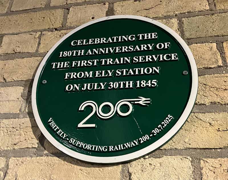 Plaque celebrating the 180th anniversary of the first train service from Ely station on July 30th 1845.