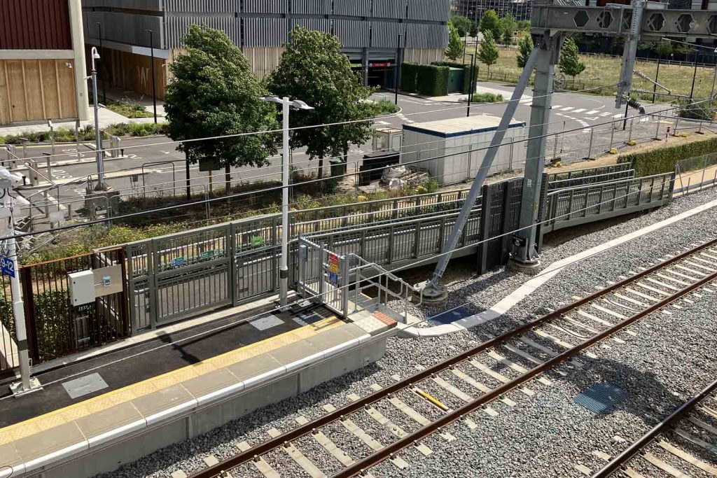 Photo of a fire escape passageway at the end of one of the side platforms at Cambridge South.